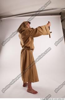 15 2018 01 JOEL ADAMSON MONK WITH CRUCIFIX AND SWORD